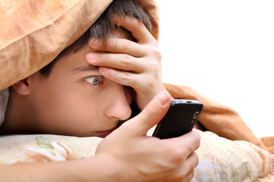Teenager With Cellphone